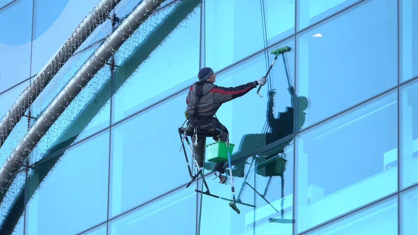 Safety professional working at height, representing our careful, considered approach